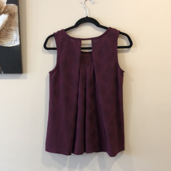 Ricki’s dark purple sleeveless blouse. - Picture 2 of 5